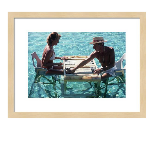 Keep Your Cool by Slim Aarons Framed Print