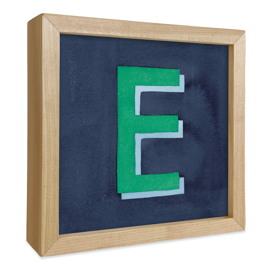 "E" Framed Print